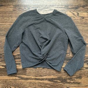Cropped twist front LS Lululemon top. Light sweatshirt material. Size 6. EUC